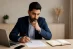 wide professional photo of a Pakistani entrepreneur working